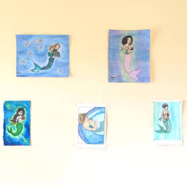 A few of my favorite Mermamame paintings that were hanging in my home before being shipped to their new homes!
